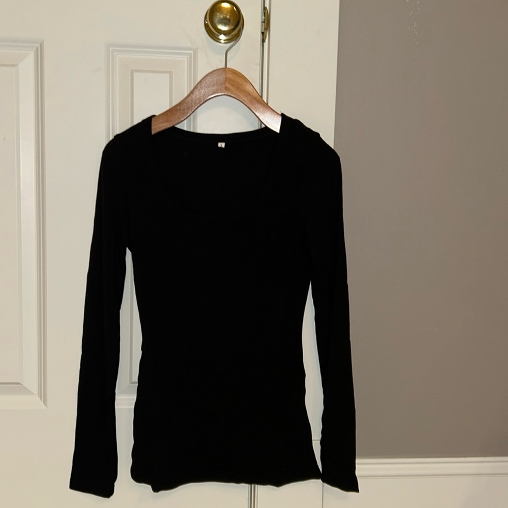 Plain black long sleeve shirt.